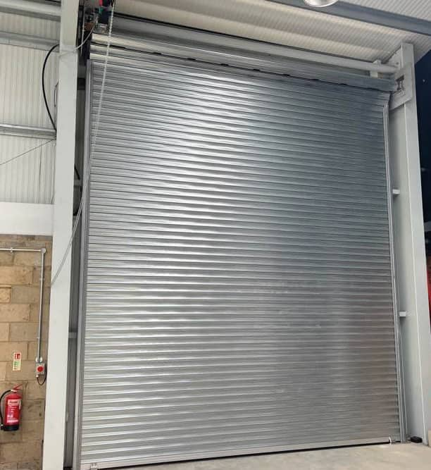 2 alliance door S11DD industrial roller shutters in a warehouse